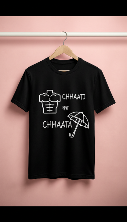 Black t-shirt with graphic design and text on a pink background