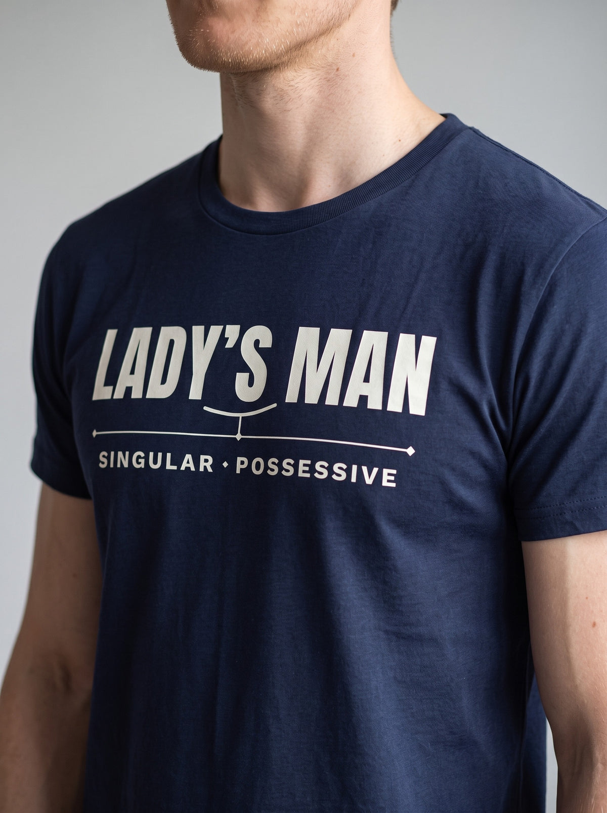 Lady's Man tee in Navy — angled close-up [kk-studio]