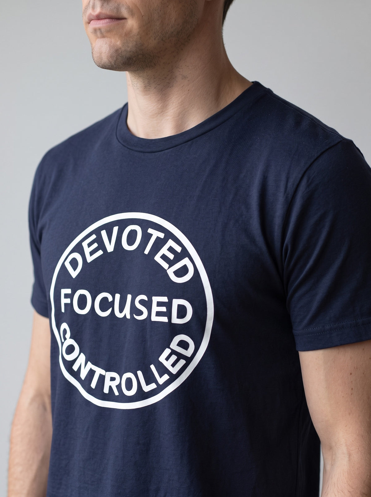 Devoted, Focused, Controlled tee in Navy — angled close-up [kk-studio]