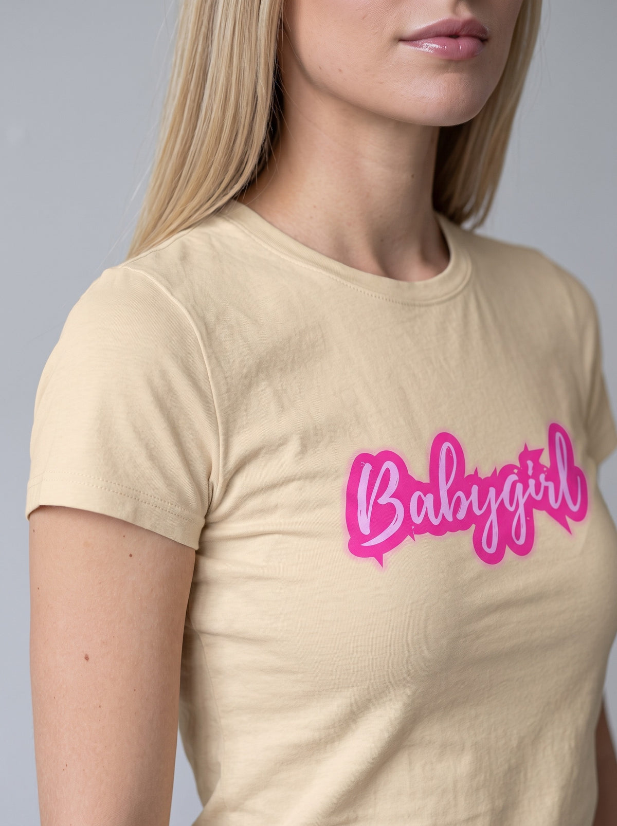 Babygirl tee in Soft Cream — angled close-up [kk-studio]