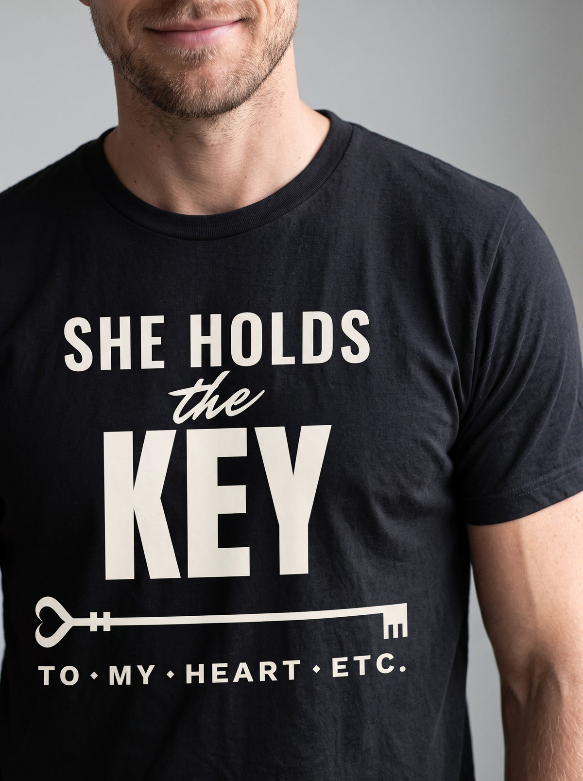 She Holds the Key tee in Black — angled close-up [kk-studio]