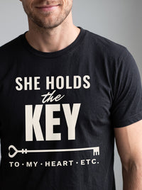 She Holds the Key tee in Black — angled close-up [kk-studio]