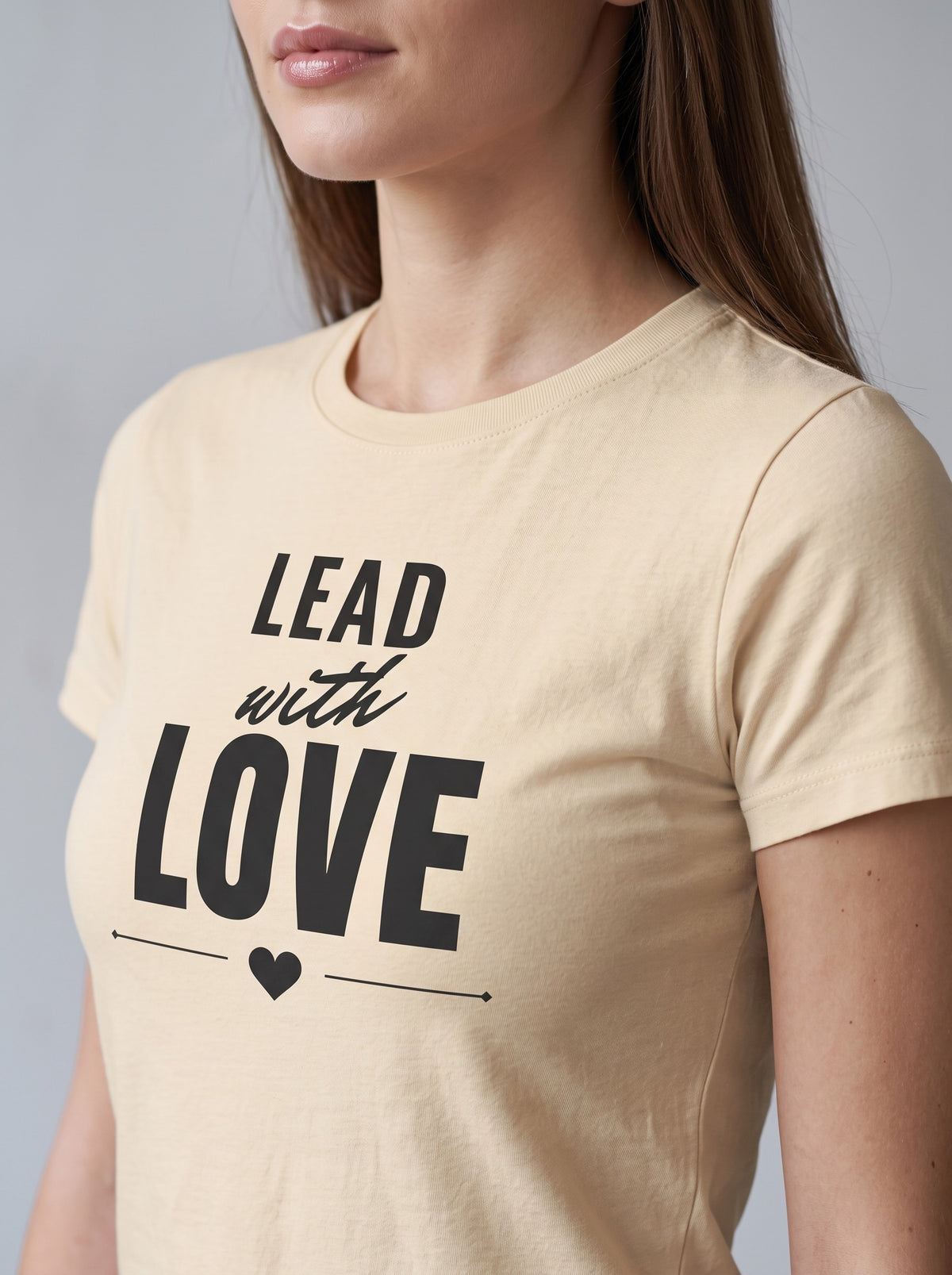 Lead With Love tee in Soft Cream — angled close-up [kk-studio]