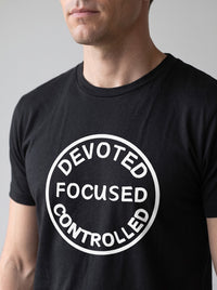 Devoted, Focused, Controlled tee in Black — angled close-up [kk-studio]