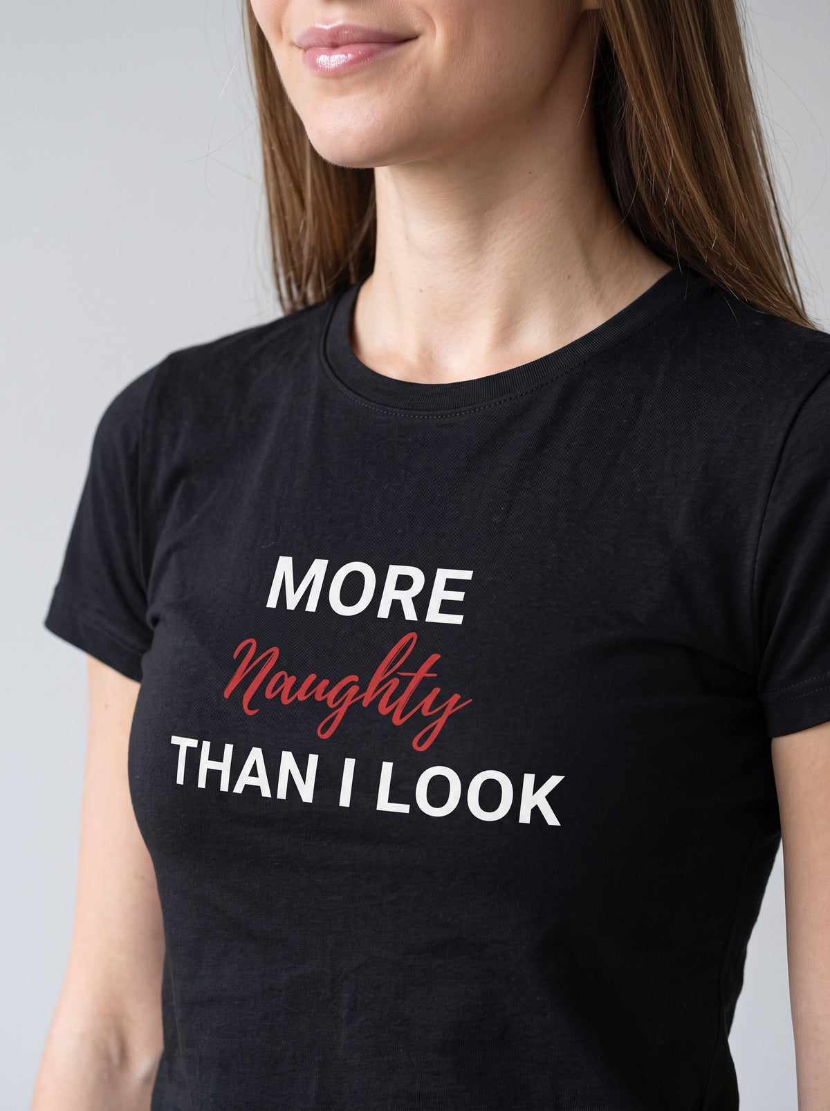 More Naughty Than I Look tee in Black — angled close-up [kk-studio]