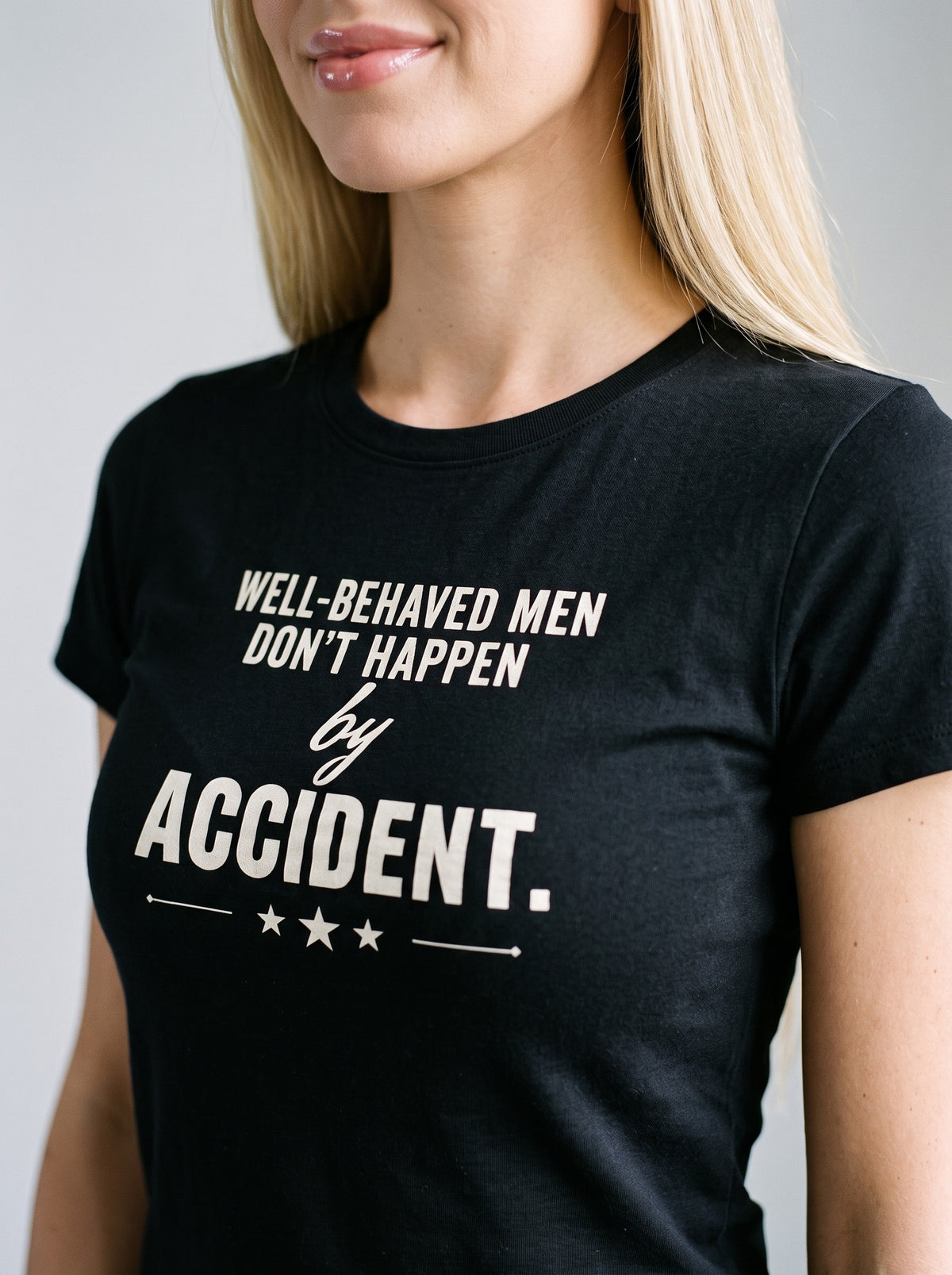 Well-Behaved Men Don't Happen by Accident tee in Black — angled close-up [kk-studio]