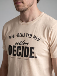 Well-Behaved Men Seldom Decide tee in Soft Cream — angled close-up [kk-studio]