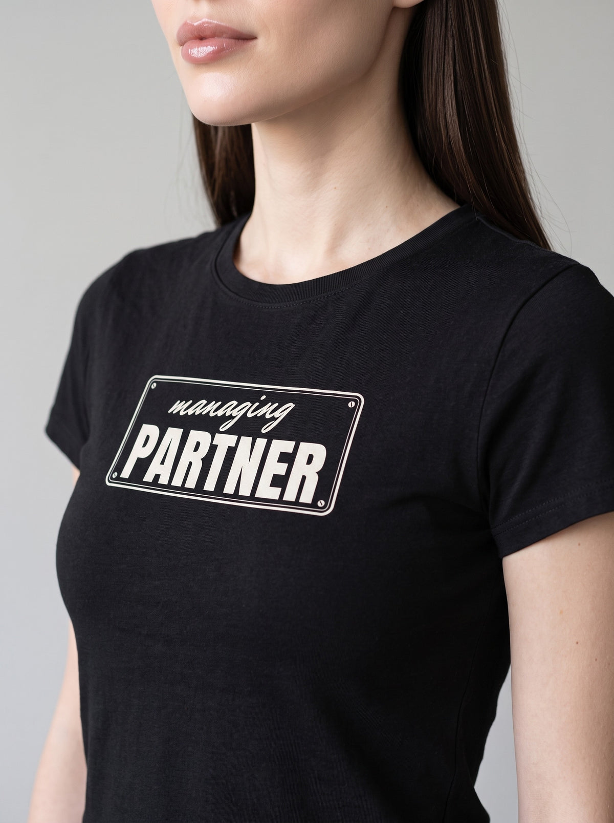 Managing Partner tee in Black — angled close-up [kk-studio]