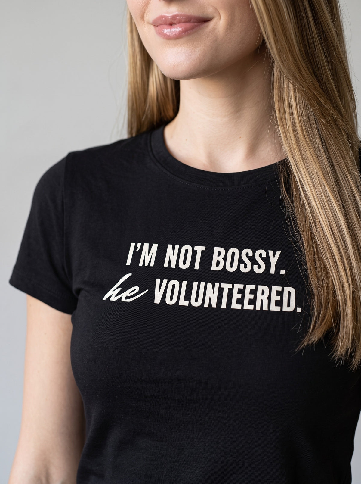 I'm Not Bossy. He Volunteered. tee in Black — angled close-up [kk-studio]