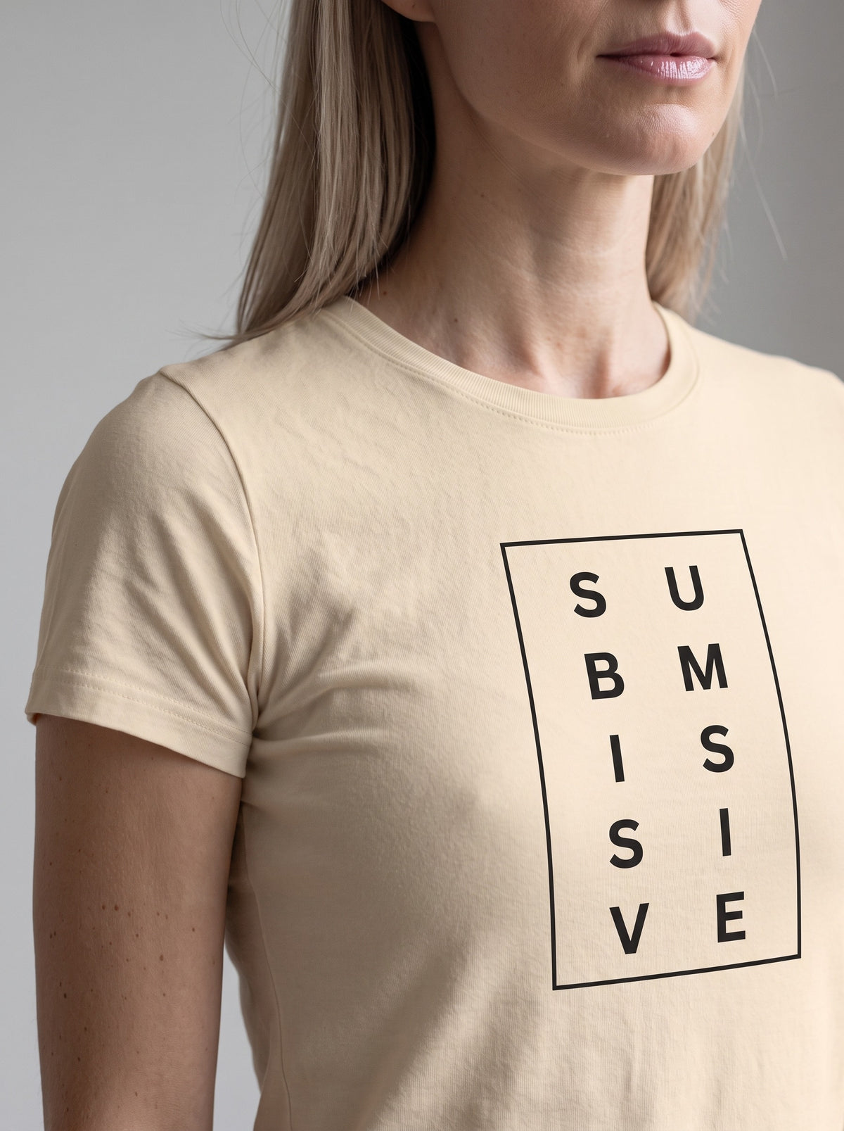Submissive tee in Soft Cream — angled close-up [kk-studio]