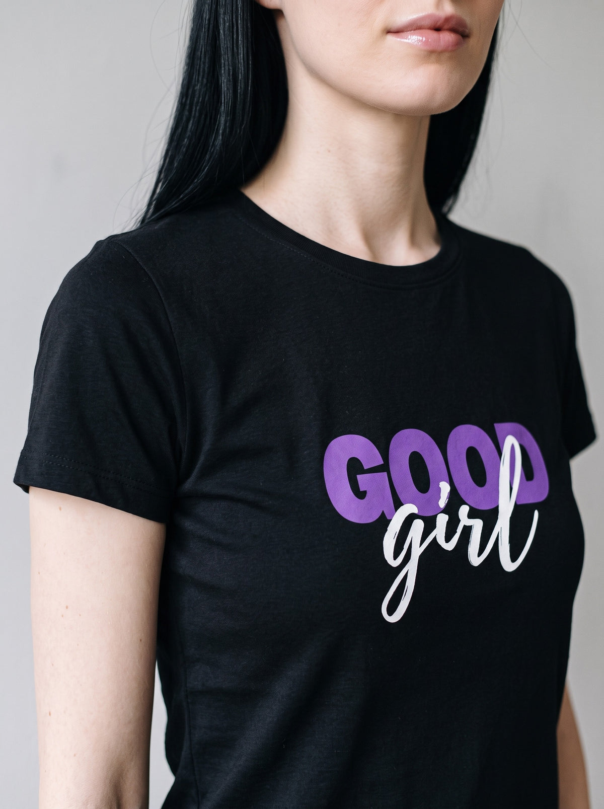 Good Girl tee in Black — angled close-up [kk-studio]