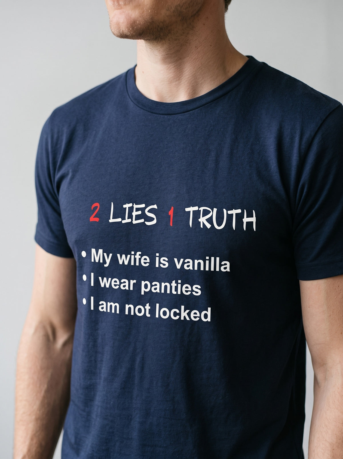 2 Lies, 1 Truth tee in Navy — angled close-up [kk-studio]