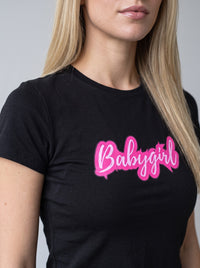 Babygirl tee in Black — angled close-up [kk-studio]
