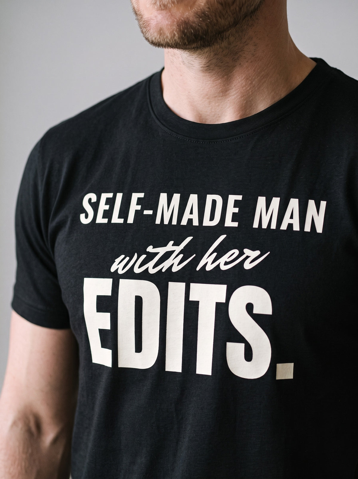 Self-Made Man With Her Edits tee in Black — angled close-up [kk-studio]