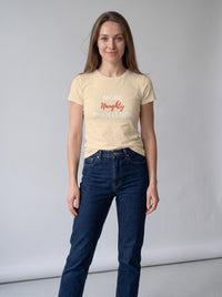 More Naughty Than I Look tee in Soft Cream — front [kk-studio]