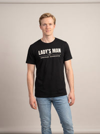 Lady's Man tee in Black — front [kk-studio]