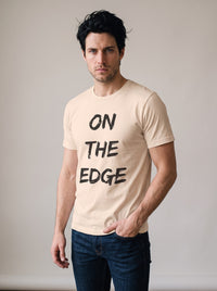 On the Edge tee in Soft Cream — three-quarter view [kk-studio]