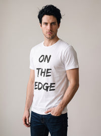 On the Edge tee in White — three-quarter view [kk-studio]
