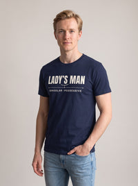 Lady's Man tee in Navy — three-quarter view [kk-studio]