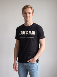 Lady's Man tee in Black — three-quarter view [kk-studio]
