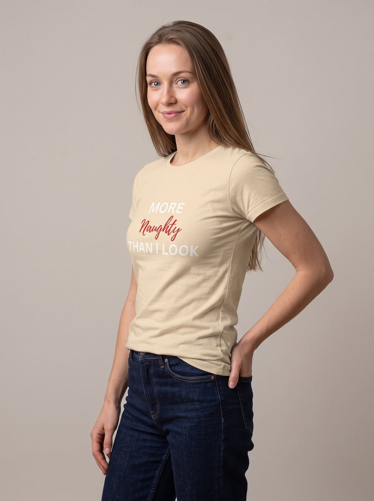 More Naughty Than I Look tee in Soft Cream — three-quarter view [kk-studio]