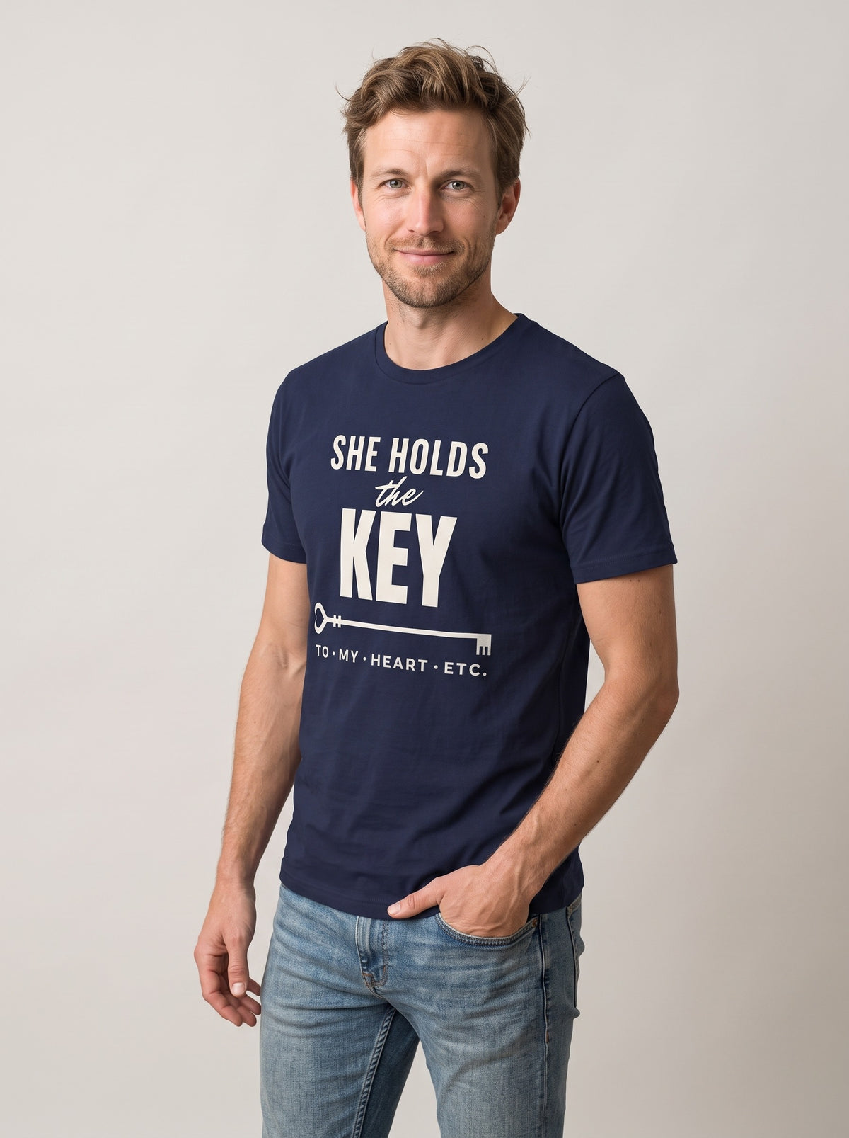 She Holds the Key tee in Navy — three-quarter view [kk-studio]